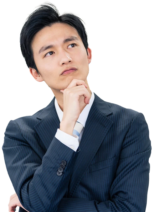 悩みを思い浮かべるビジネスパーソン